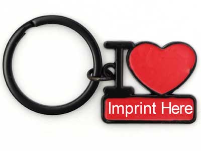A wholesale black metal keychain featuring an enamel design with a capital letter I, a large red heart, and a red banner that reads Imprint Here